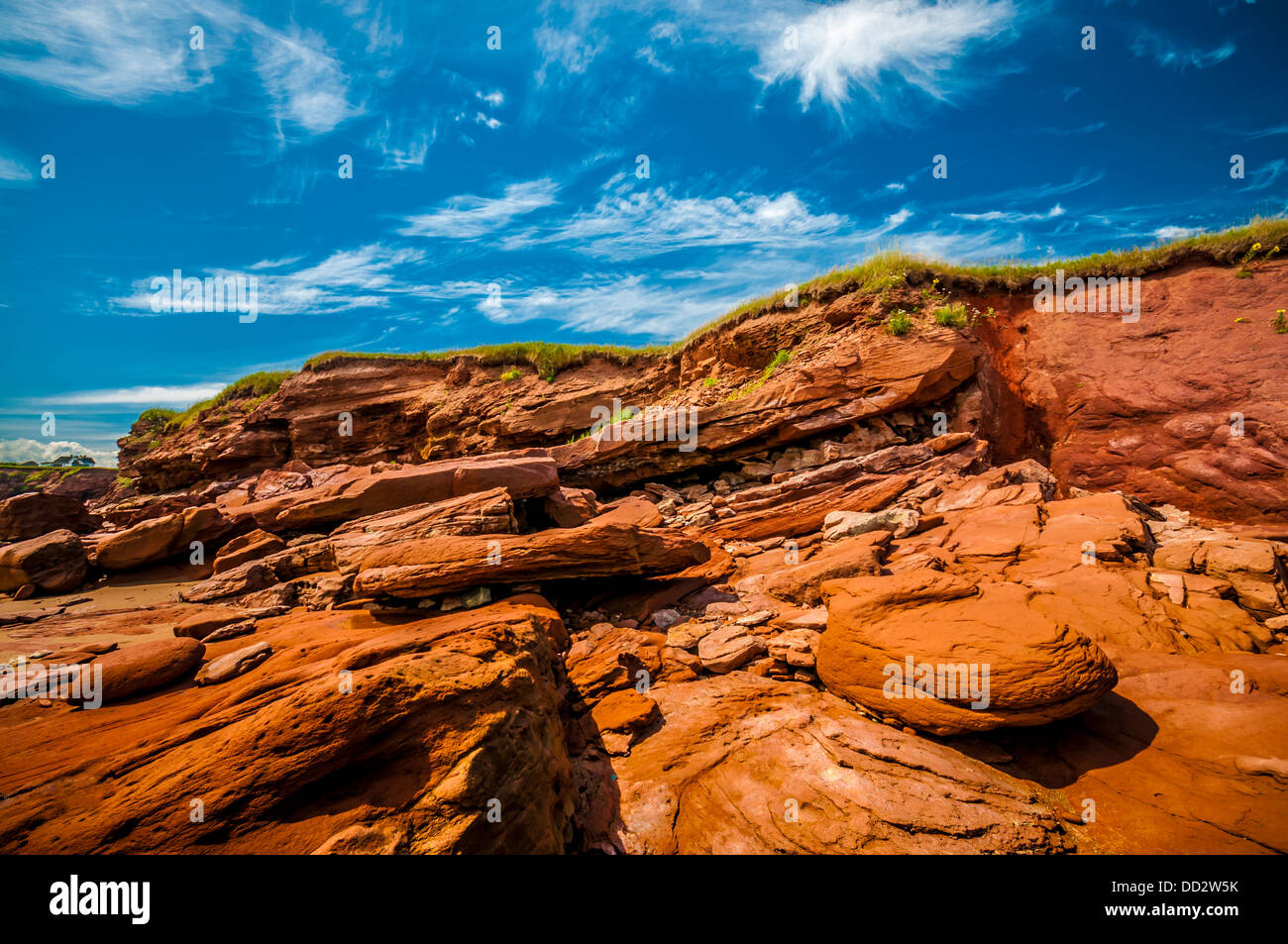 Eroded red rock cliff in New Brunswick Canada Stock Photo