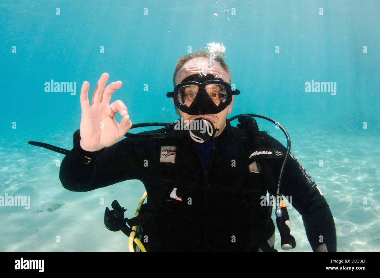 Underwater Hand signs Stock Photo