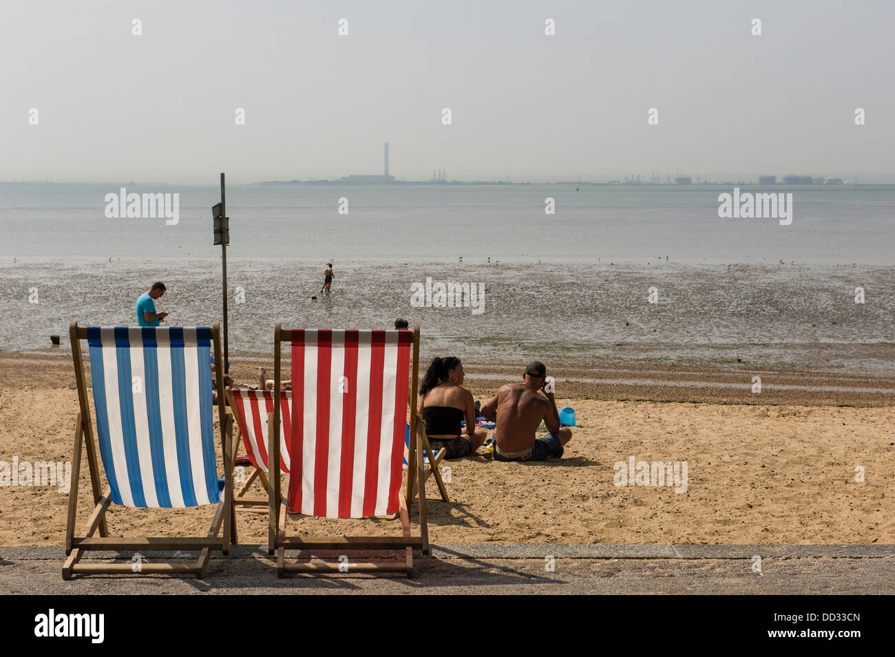 Two deck chairs on the beach. Stock Photo
