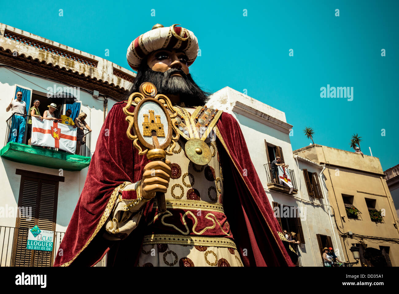 Sitges, Spain. August 24th, 2013: The giant of Sitges, a costumed figure known as "gegants", dances in the streets of Sitges during the Festa Major Credit:  matthi/Alamy Live News Stock Photo
