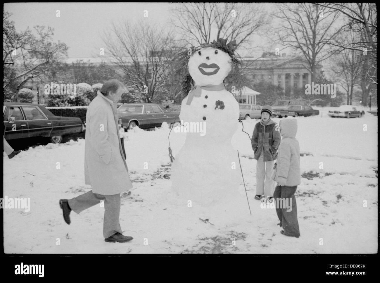 President Carter views snowman built by Amy Carter and her friends. - - 177590 Stock Photo