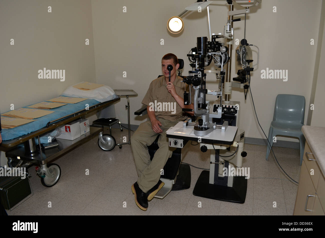 Inmate getting fitted for glasses inside prison Stock Photo Alamy