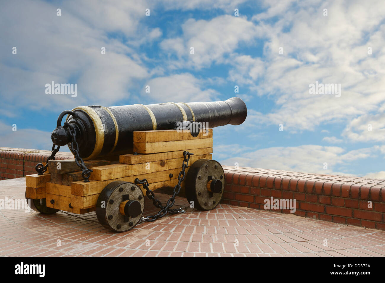 Cannon pointing towards a blue sky Stock Photo