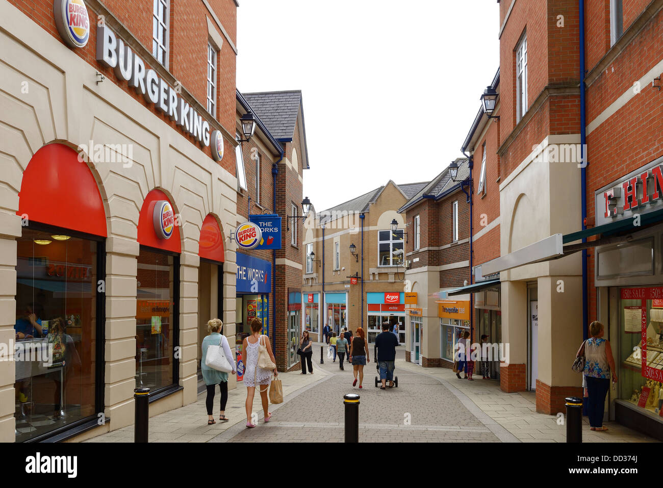 Shoppers walking through Chesterfield town centre uk Stock Photo