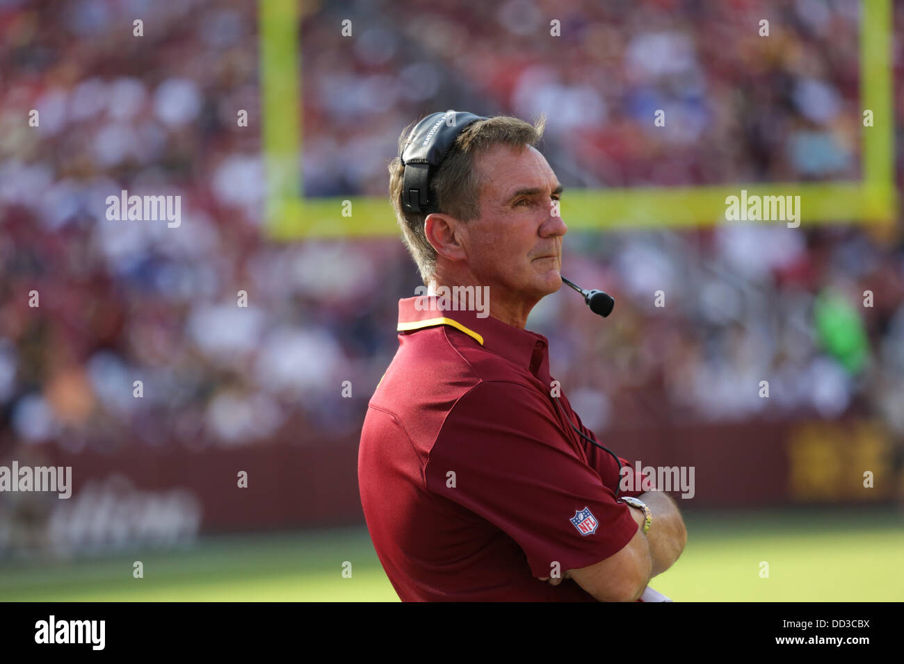 Saturday August 24th, 2013, Washington Redskins hosts the Buffalo Bills at FedEx Field in Landover Maryland for the third preseason game. Washington Redskins win 30-7. Head Coach Mike Shanahan of the Washington Redskins watches his players from the sideline. Credit:  Khamp Sykhammountry/Alamy Live News Stock Photo