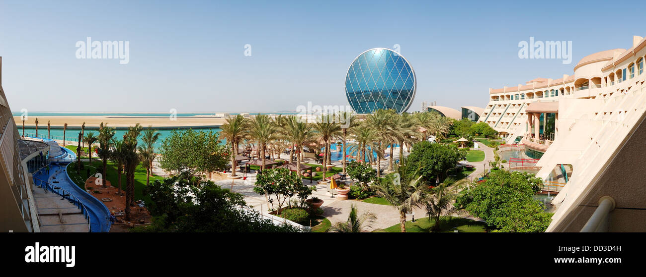 The panorama of luxury hotel and circular building, Abu Dhabi, UAE Stock Photo
