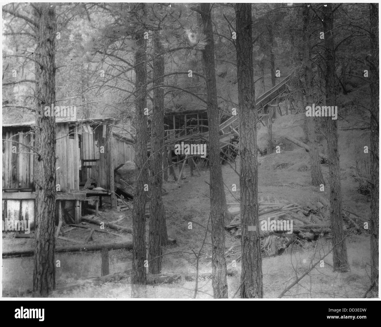 Shorting house and lower end of ore chute at Great Northern Mica Lode - - 286103 Stock Photo