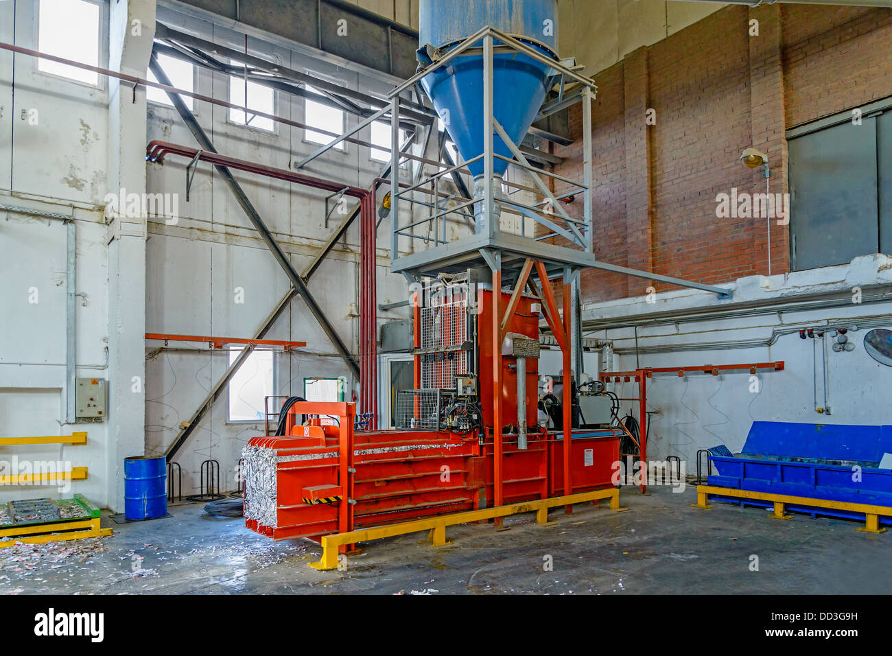 Hydraulic press for briquetting of paper waste Stock Photo Alamy