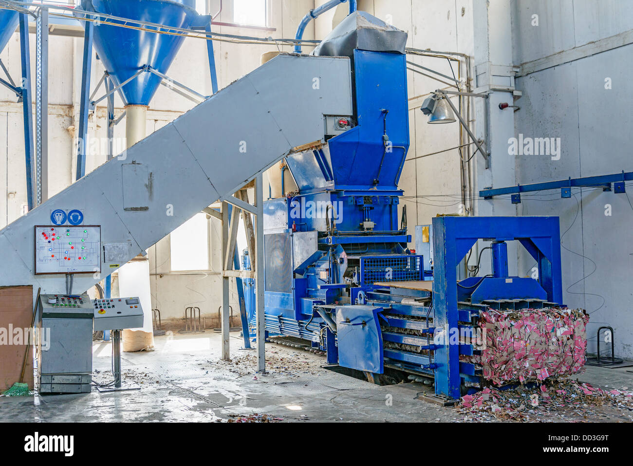 Hydraulic press for briquetting of paper waste Stock Photo