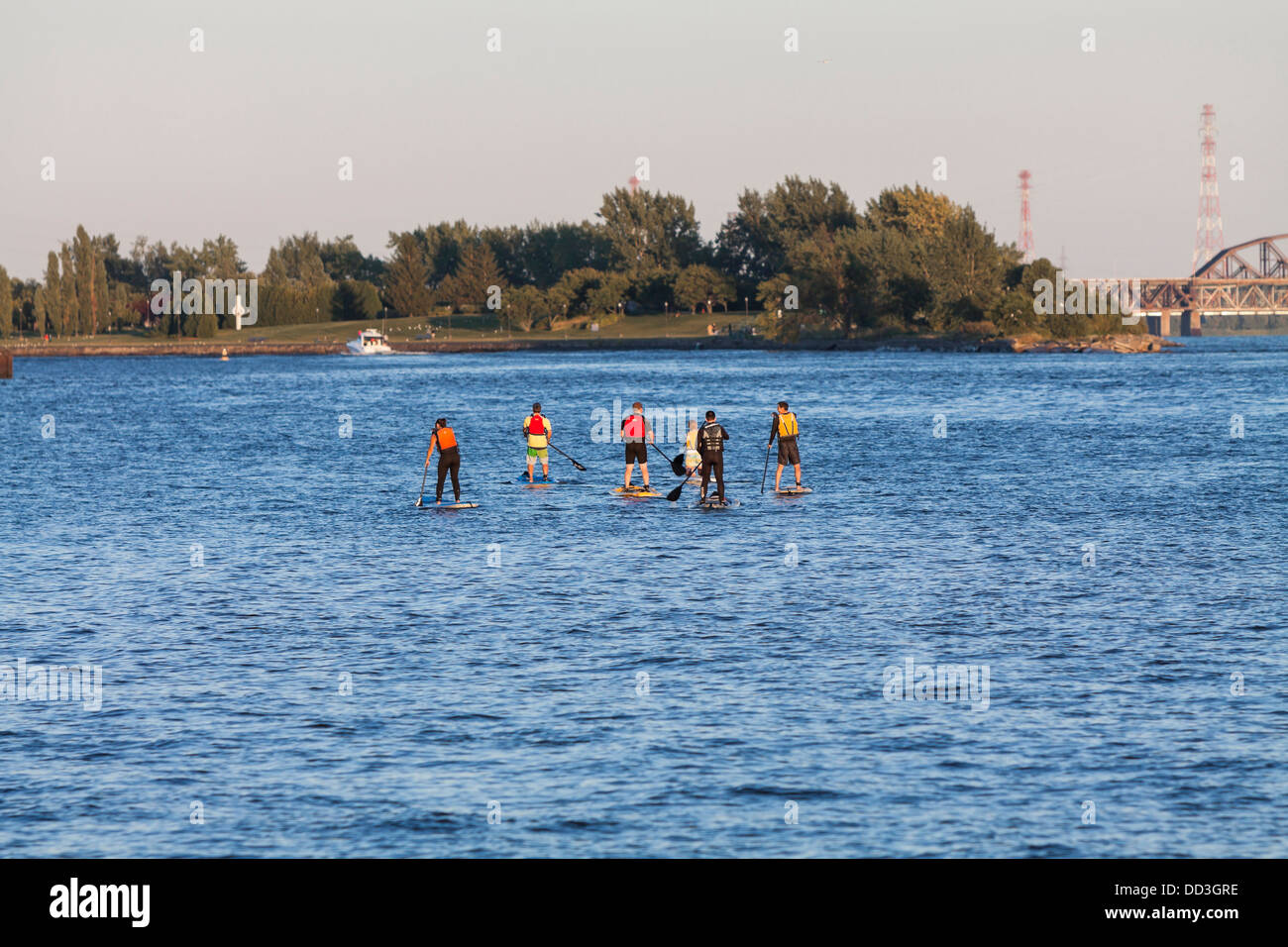 River surfing on Saint Lawrence river in Montreal Stock Photo