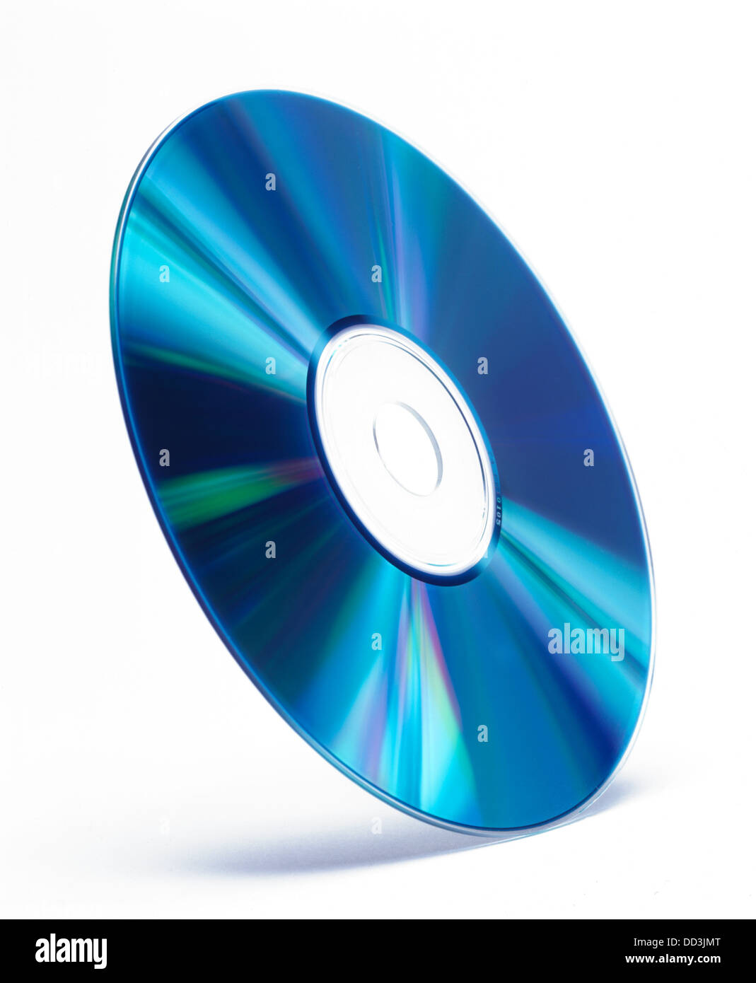 A compact disc standing on a white background. Stock Photo