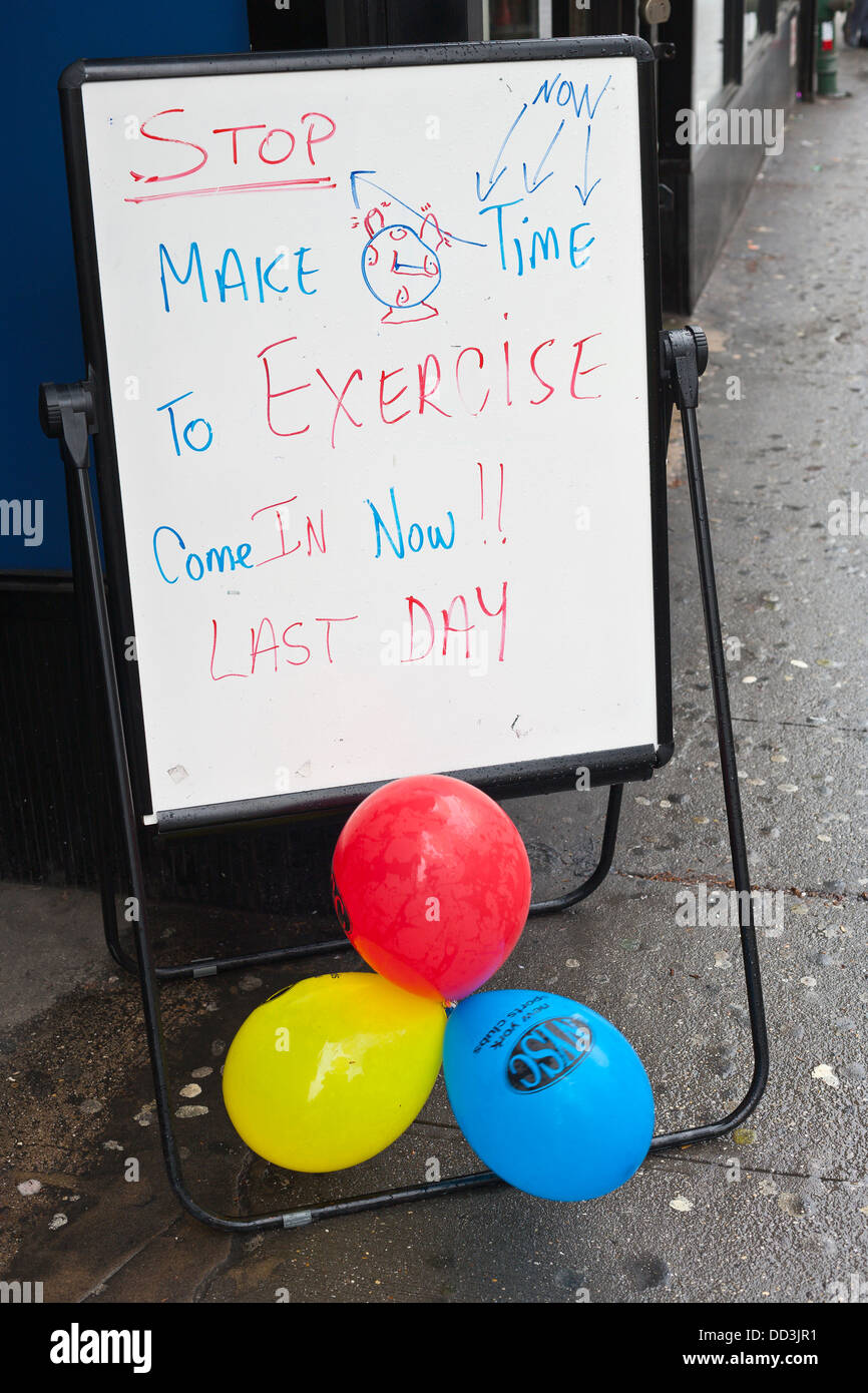 Noticeboard outside a gym in New York Stock Photo