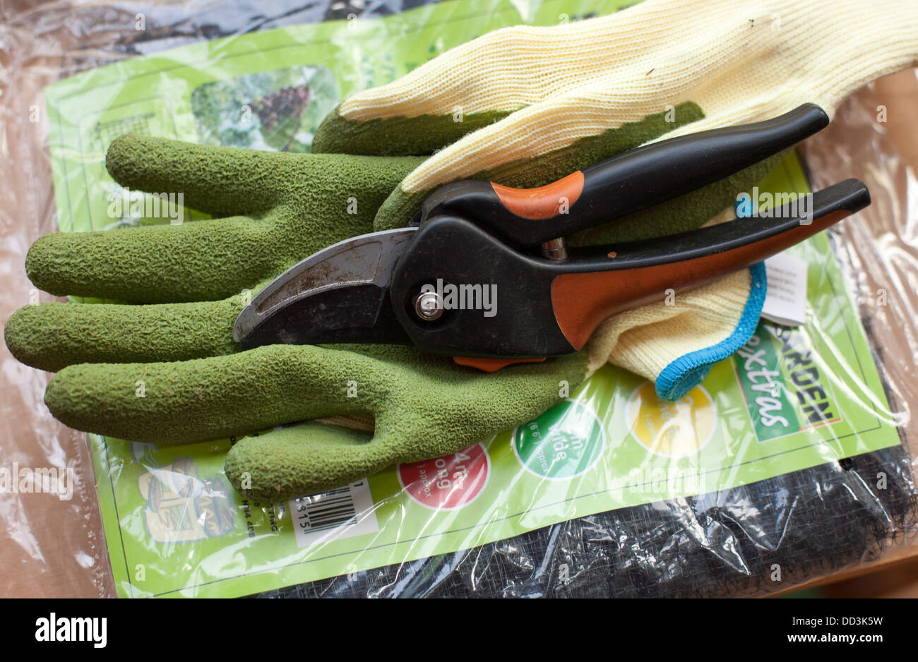 Gardening gloves and secateurs Stock Photo
