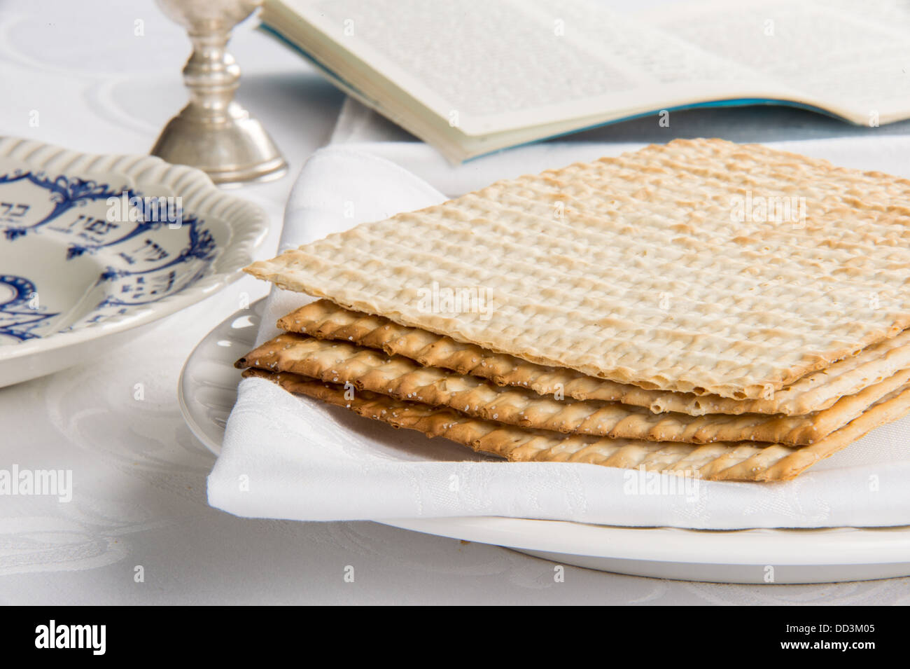 Closeup of Matzah on Plate which is the unleaven bread served at Jewish Passover dinners Stock Photo