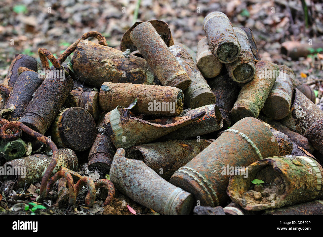 Pile of rusty First World War One artillery grenade shells, dug up in WW1 battlefield in West Flanders, Belgium Stock Photo