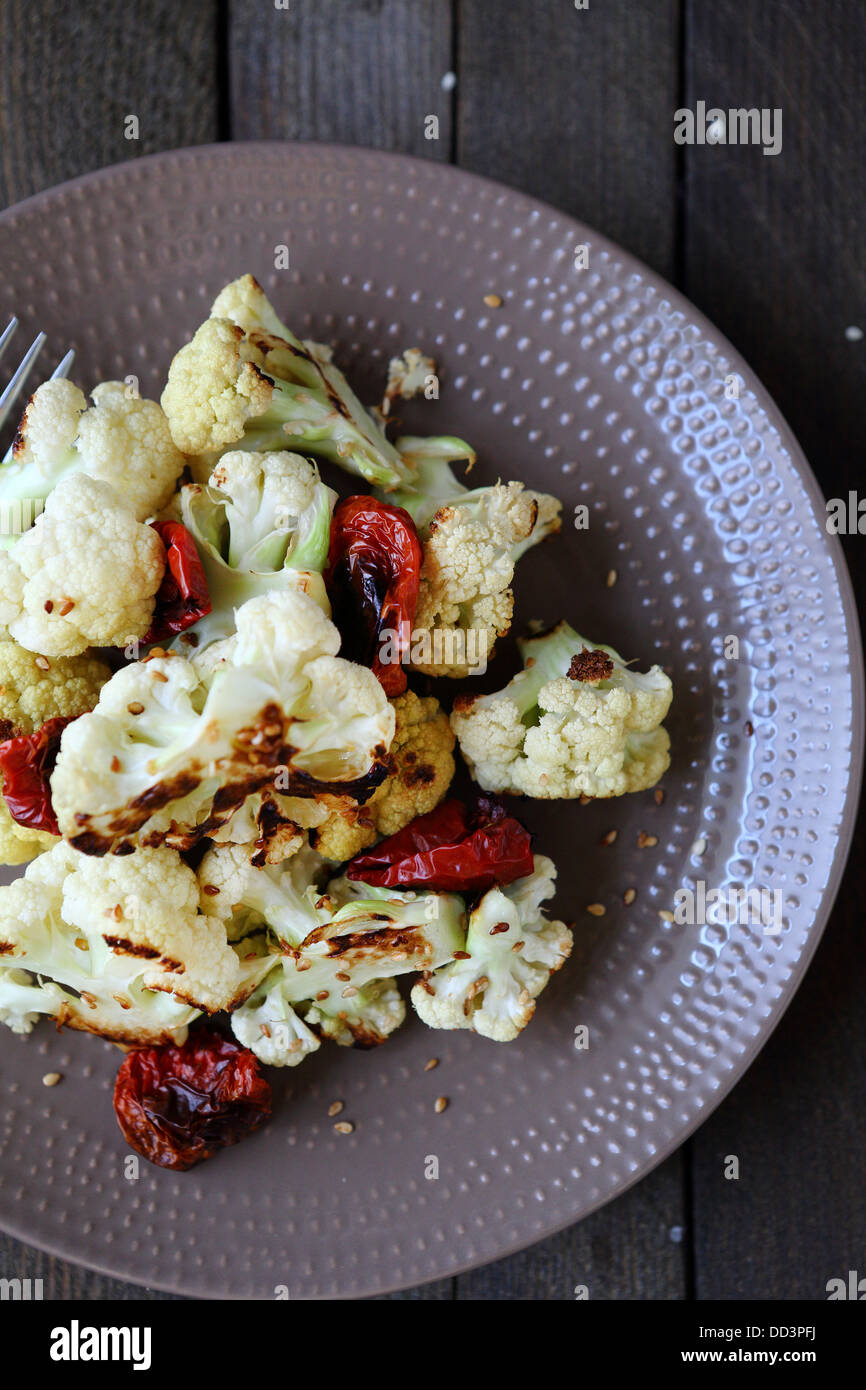 Roasted Cauliflower with sundried tomatoes, top view Stock Photo Alamy