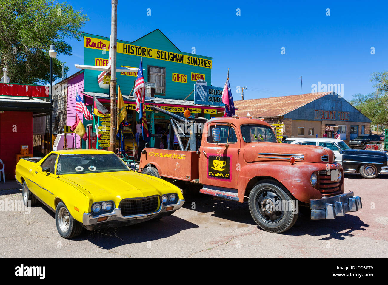 Old cars outside Route 66 Seligman Sundries store on historic Route 66, Seligman, Arizona, USA Stock Photo