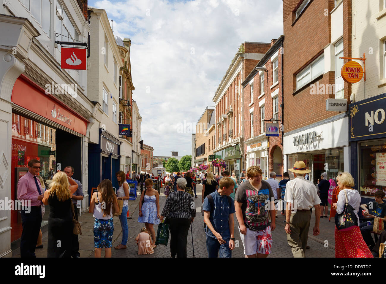 Shoppers walking through Chesterfield town centre uk Stock Photo