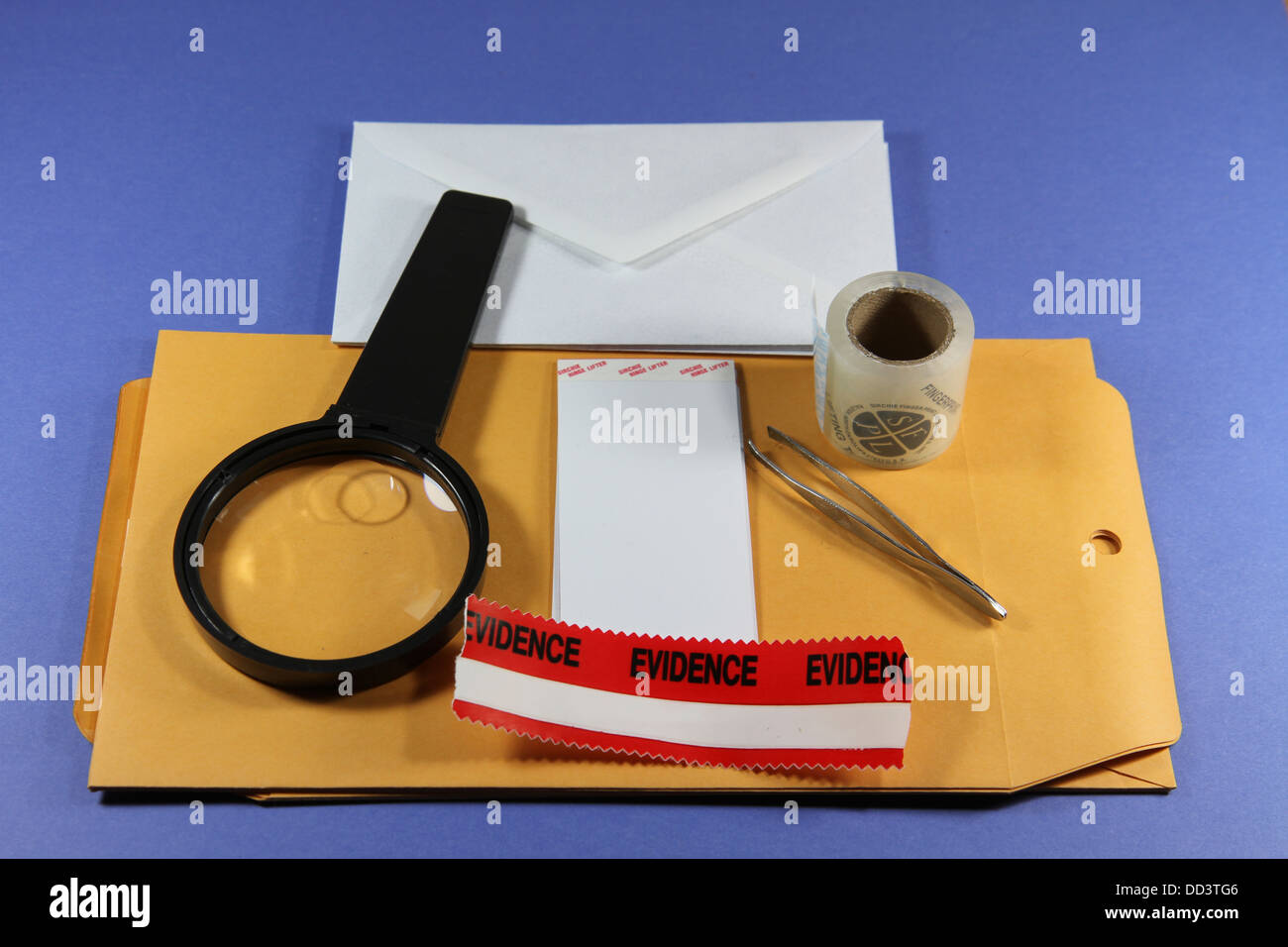 Forensic evidence gathering kit with magnifying glass, evidence tape