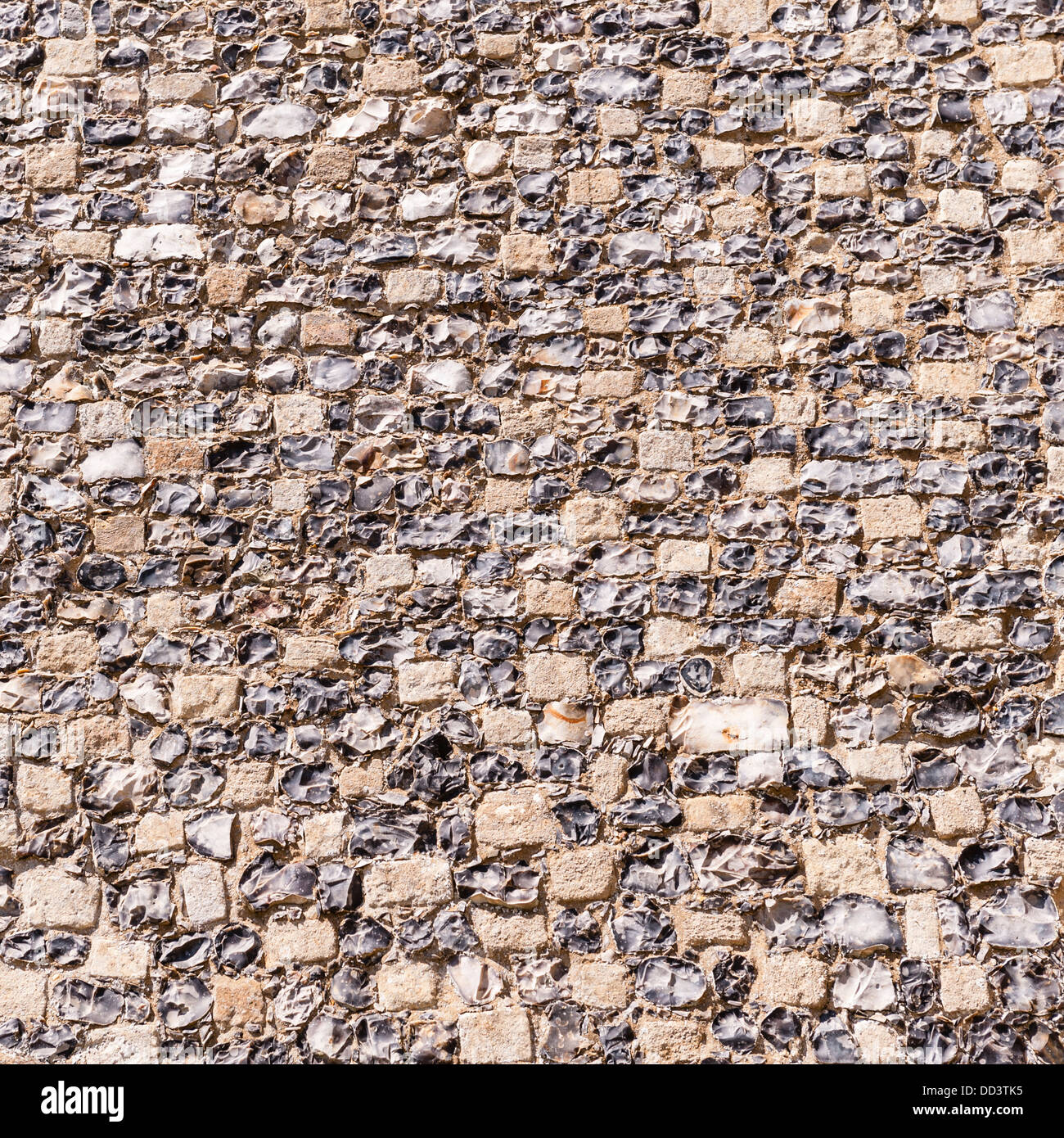 The flint wall of a church in the UK Stock Photo