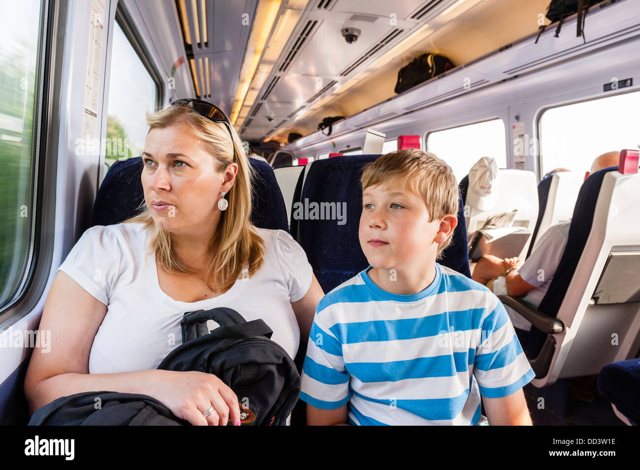 A mother and son travelling by train in the Uk Stock Photo