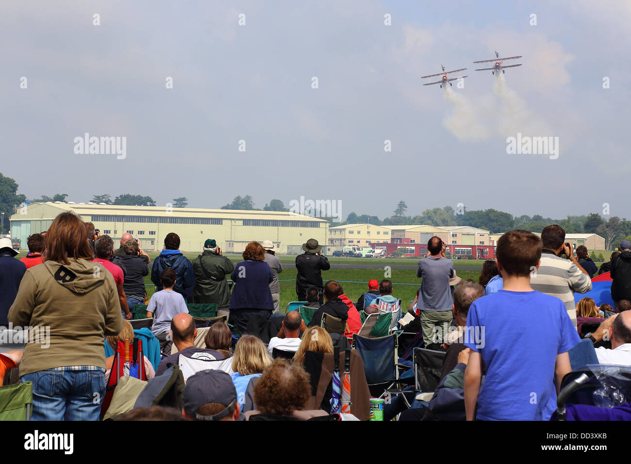 Dunsfold Airfield, Surrey, UK. 25th Aug, 2013. Wings and wheels Air show Dunsfold Airfield, Surrey, UK.  Bretling Wing Walkers Credit:  Beata Moore/Alamy Live News Stock Photo