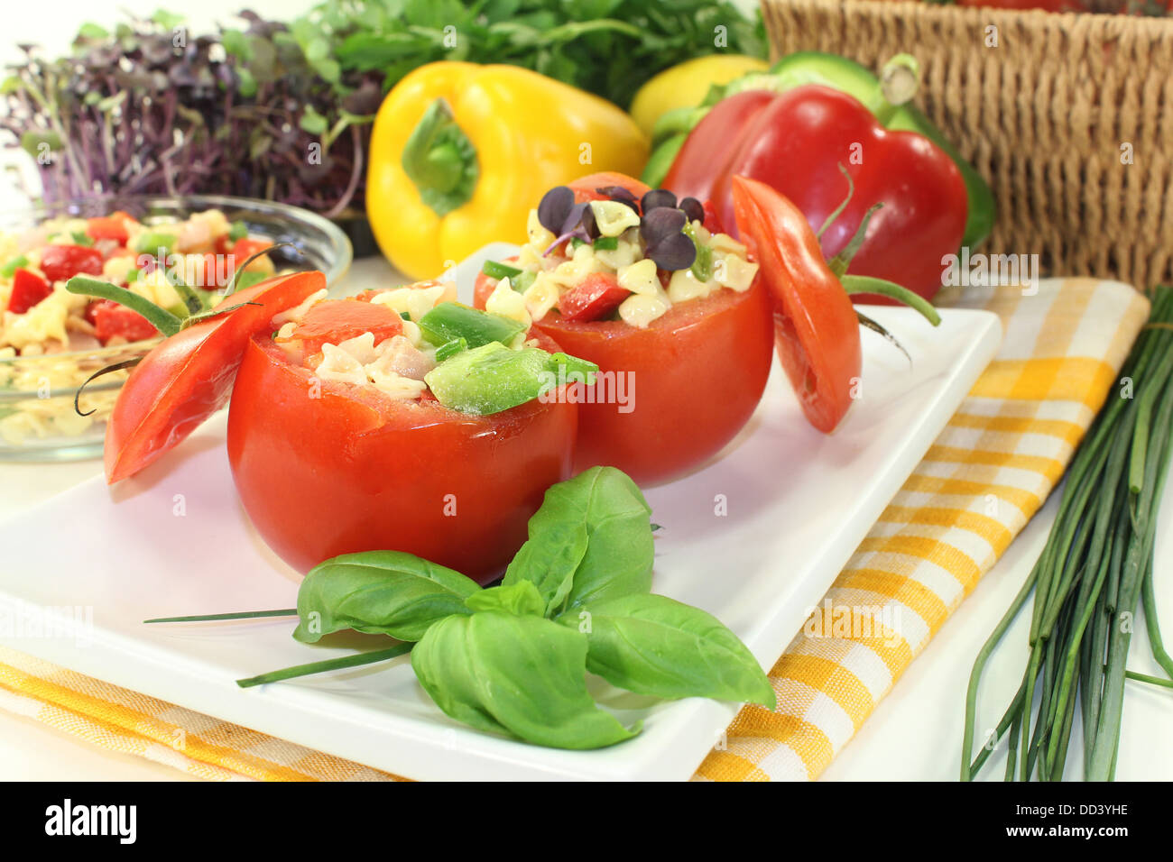 Tomatoes stuffed with fresh summer salad Stock Photo