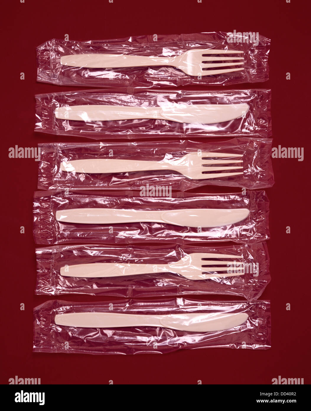 Plastic forks and knives in plastic bags Stock Photo Alamy