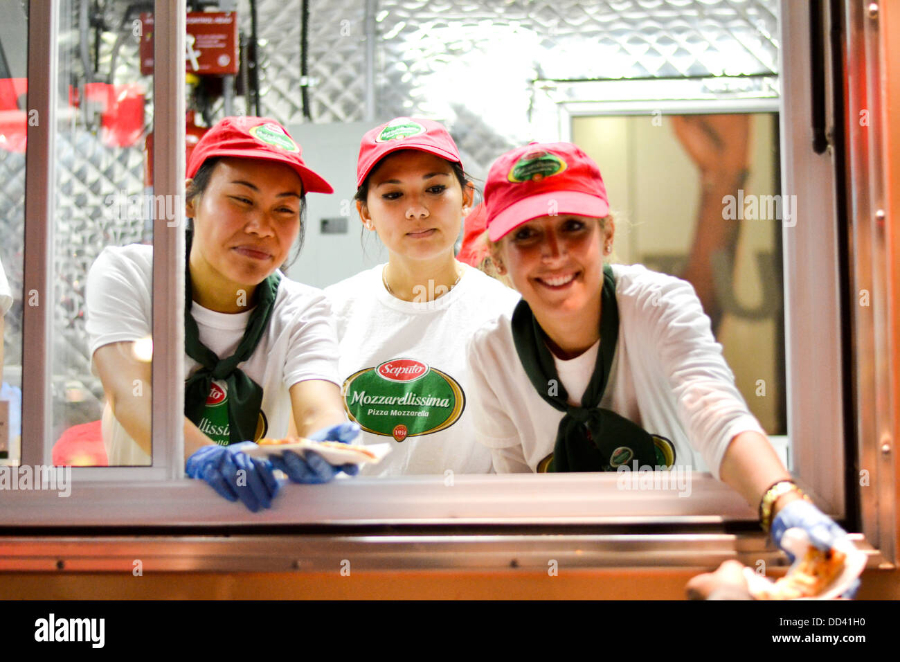 Busker fest give free food to walkers. Stock Photo