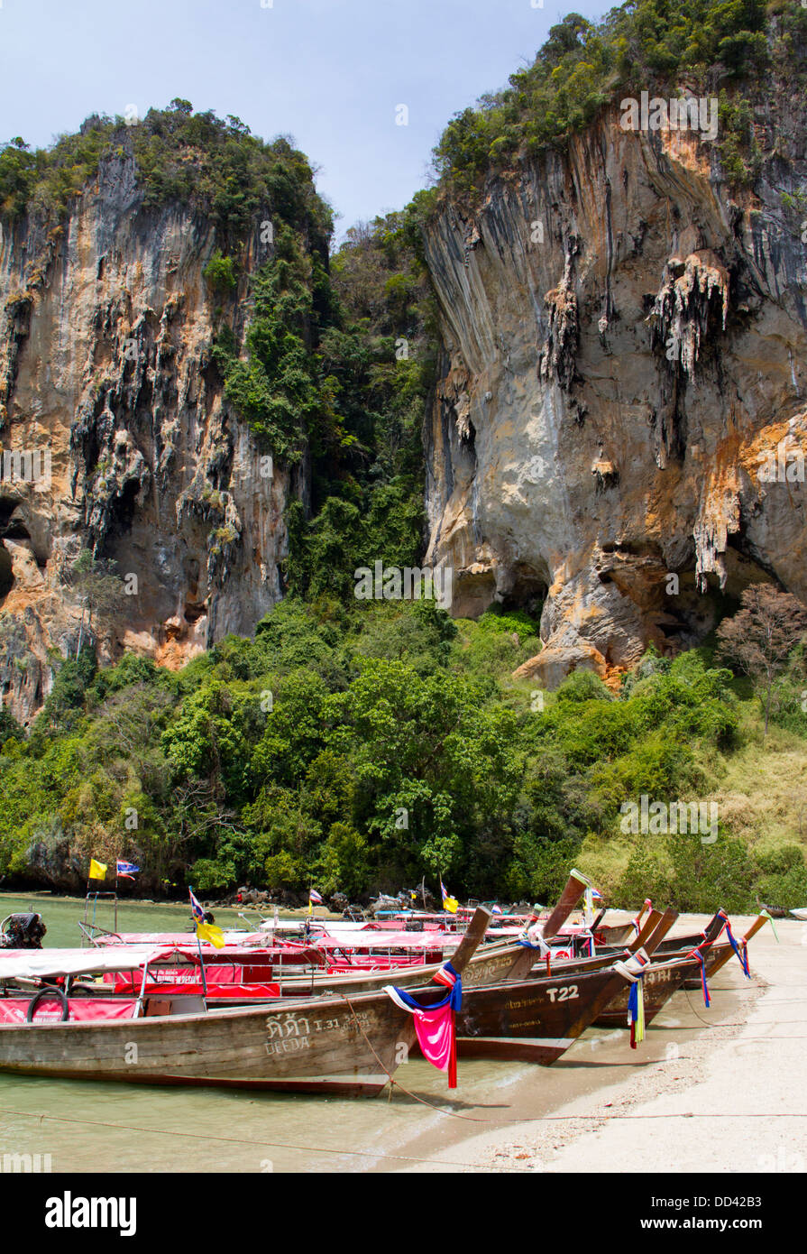 Motorboats line the beach at Hat Ton Sai in Railay. Stock Photo