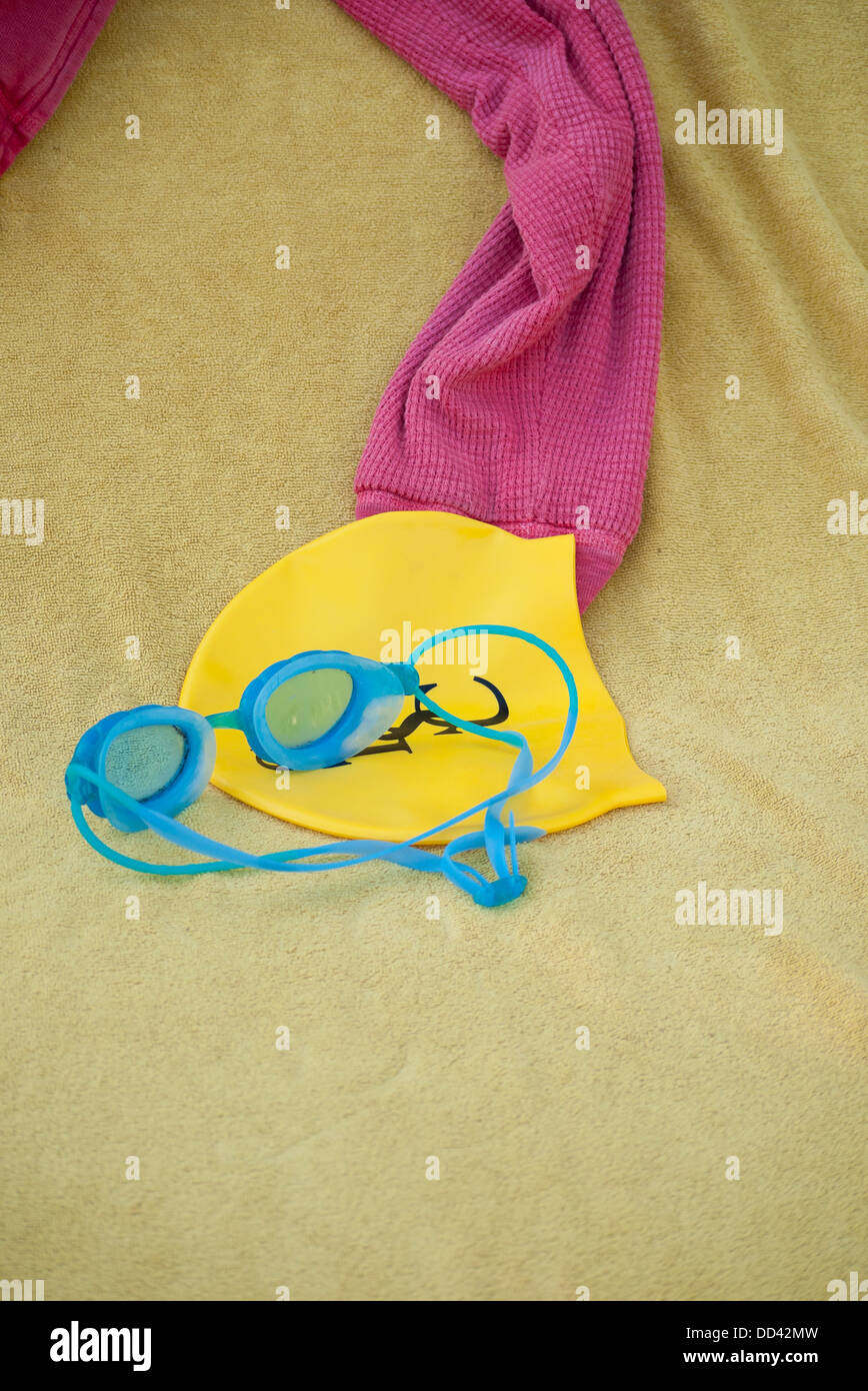 Goggles towel swimming cap Stock Photo