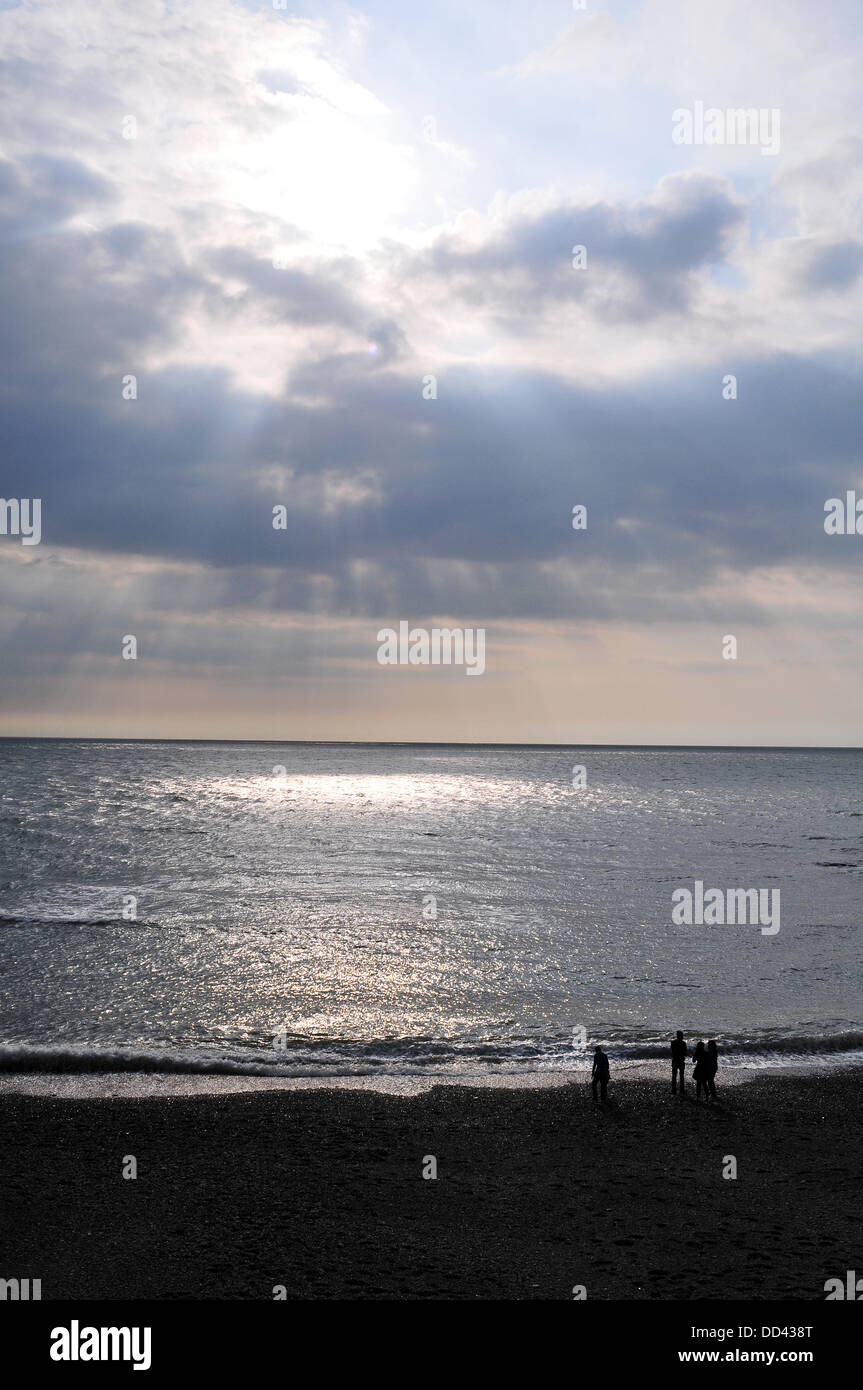 Aberystwyth, Wales, UK. 25th Aug, 2013. Visitors watch sun rays emerge