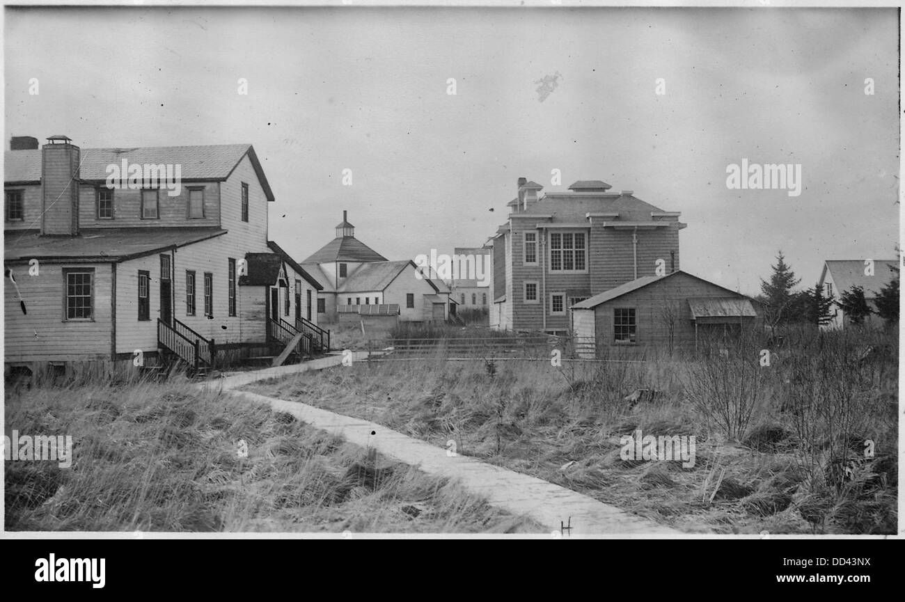 View of mission buildings in Metlakahtla, Alaska. Left, Front view of mission building, center, mission school... - - 297396 Stock Photo