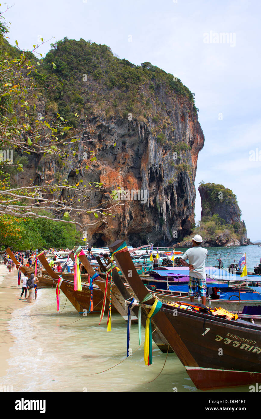 Boats anchored on the beach at Hat Phra Nang in Railay. Stock Photo