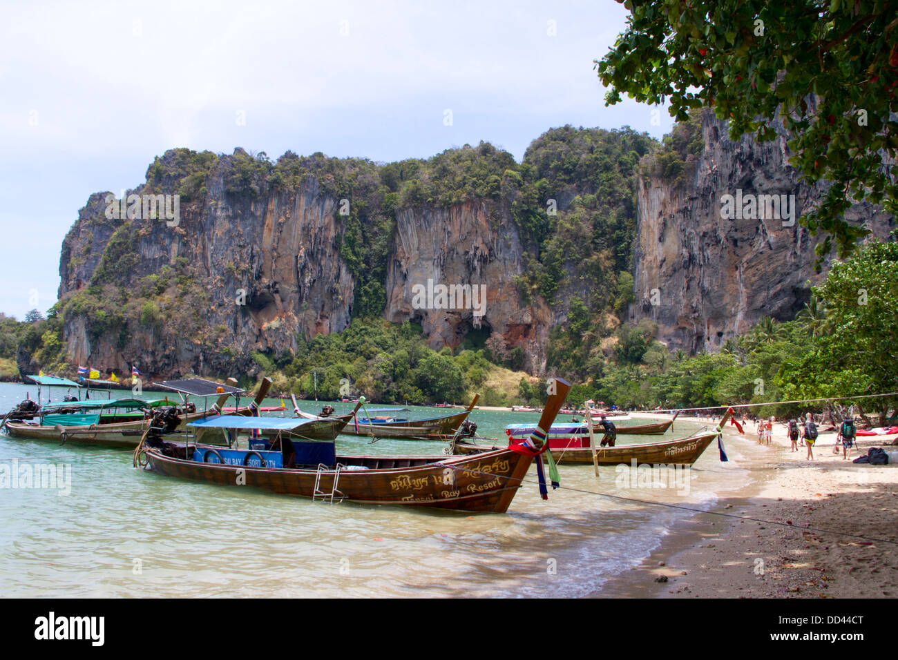 People walk on the beach at Hat Ton Sai in Railay. Stock Photo