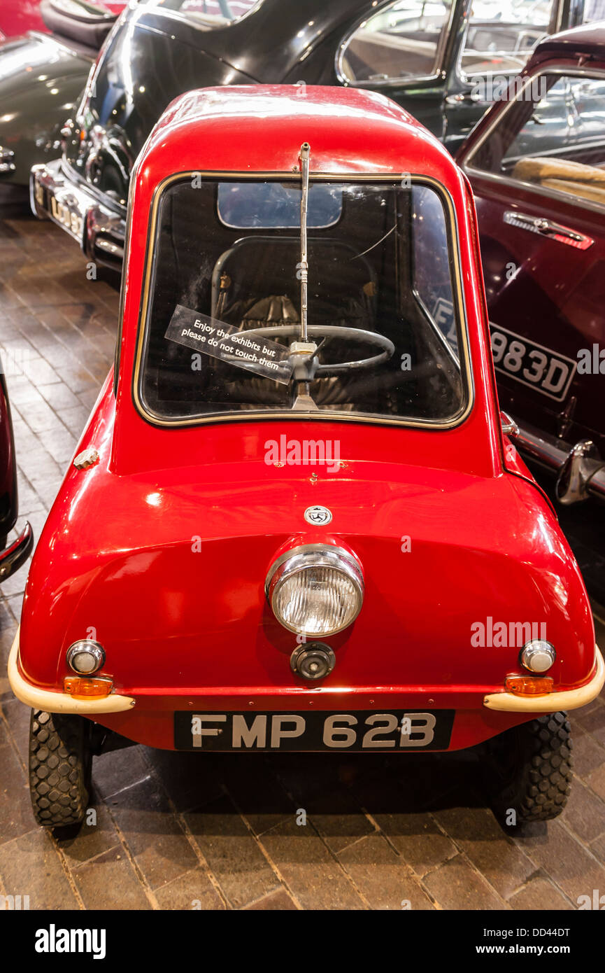 A 1964 Peel P.50 single seat fibreglass car with a 49cc motorcycle engine Inside the National Motor Museum in Beaulieu , Uk Stock Photo