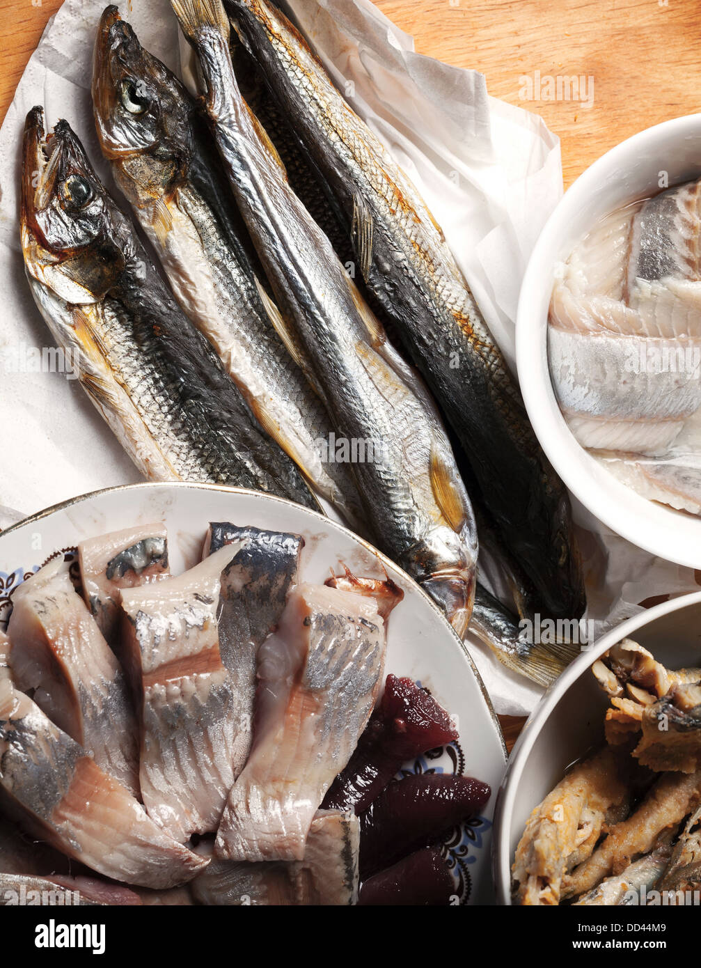 Seafood theme. Assorted fish on wooden table. Top view Stock Photo