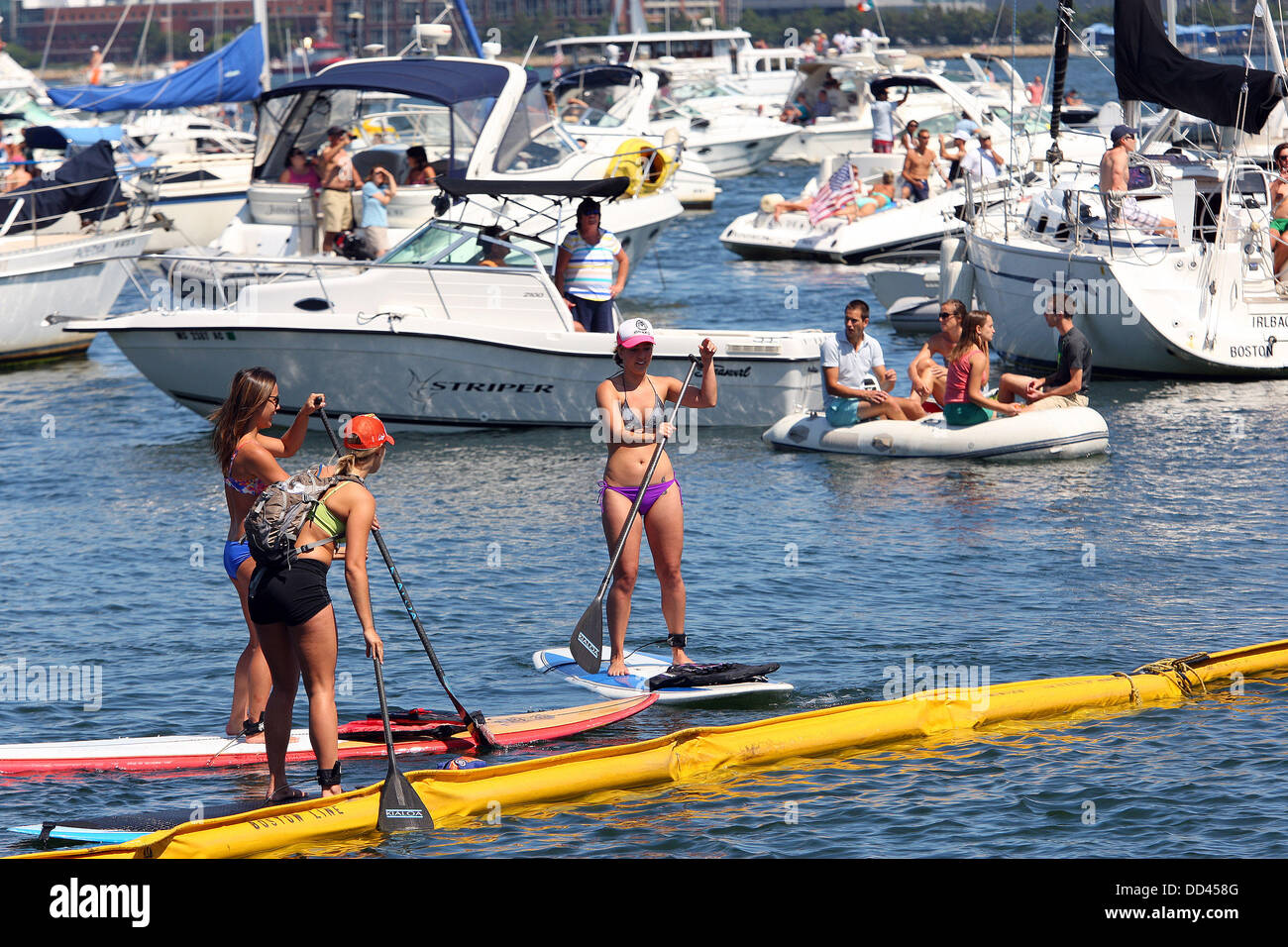 Boston, Massachusetts, USA. 25th Aug, 2013. Spectators watch the Red Bull Cliff Diving World Series at the Institute of Contemporary Art building in Boston, Massachusetts. Anthony Nesmith/CSM/Alamy Live News Stock Photo