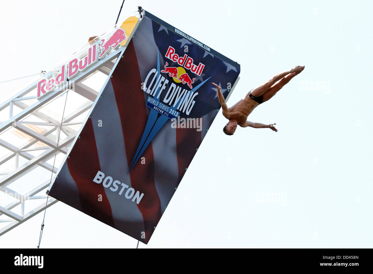 Boston, Massachusetts, USA. 25th Aug, 2013. Cliff Divers compete during the Red Bull Cliff Diving World Series at the Institute of Contemporary Art building in Boston, Massachusetts. Anthony Nesmith/CSM/Alamy Live News Stock Photo