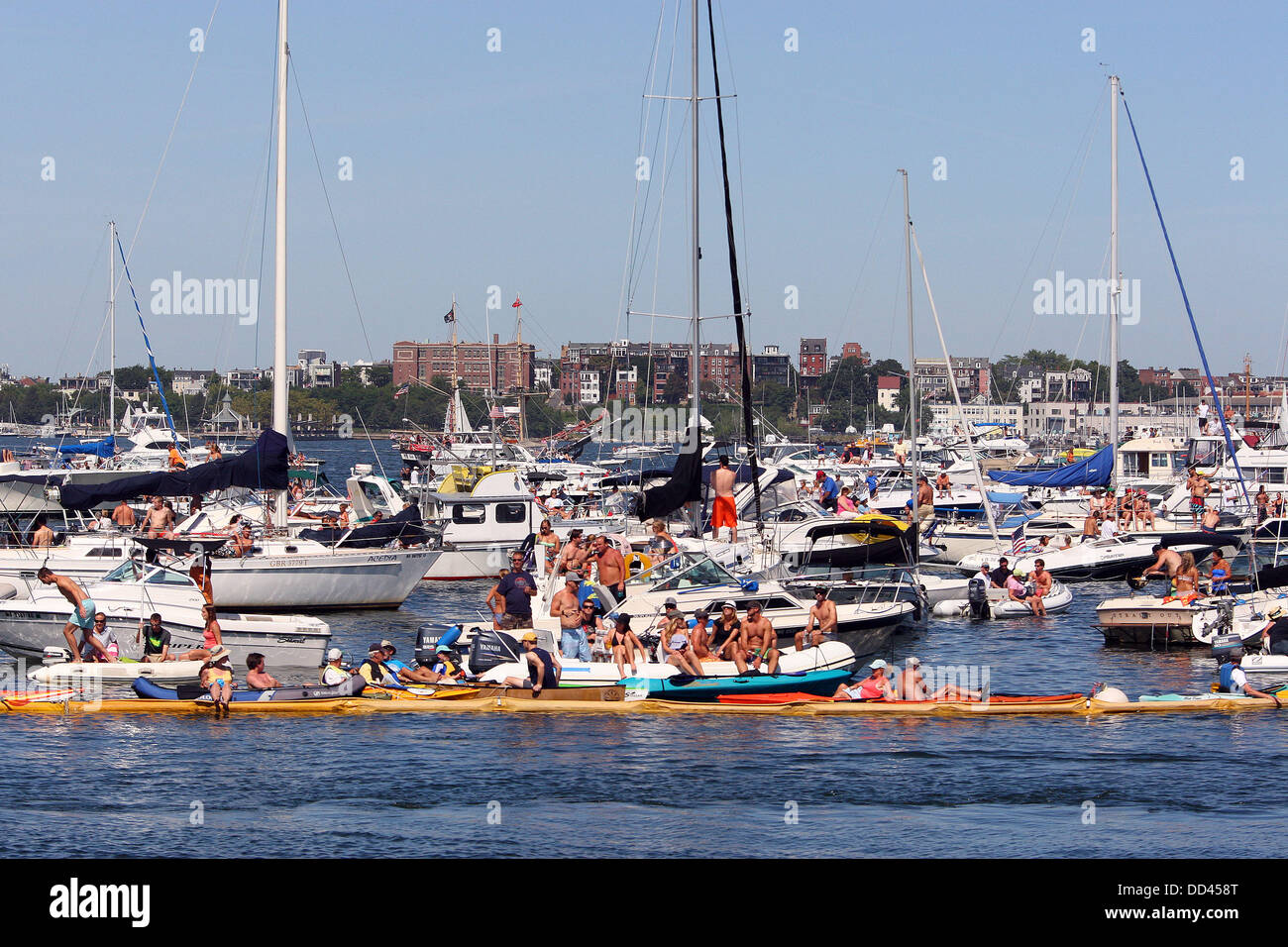 Boston, Massachusetts, USA. 25th Aug, 2013. Spectators watch the Red Bull Cliff Diving World Series at the Institute of Contemporary Art building in Boston, Massachusetts. Anthony Nesmith/CSM/Alamy Live News Stock Photo
