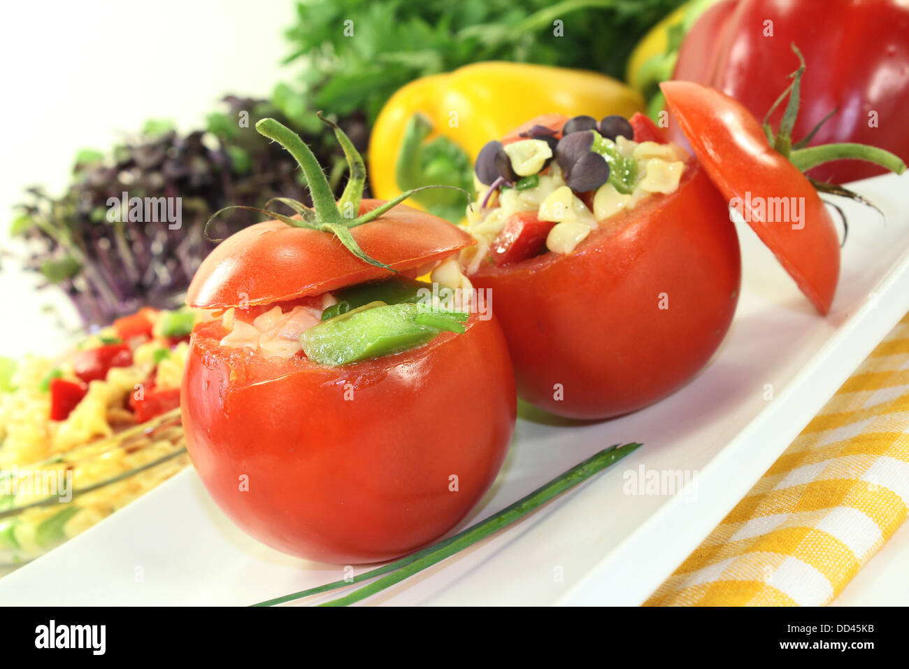 Tomatoes stuffed with fresh summer salad Stock Photo