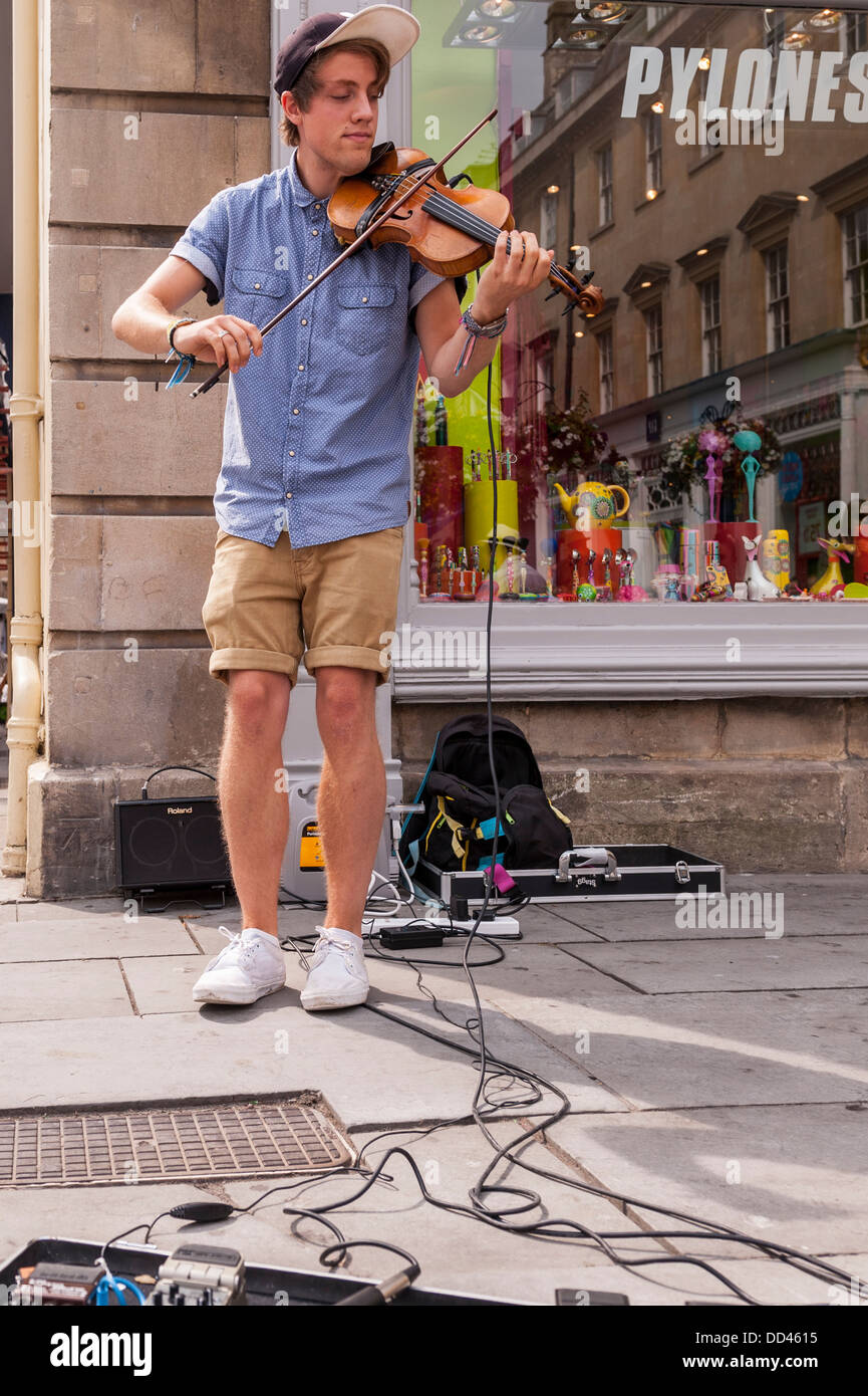 The violinist Joel Grainger busking in Bath , Somerset , England