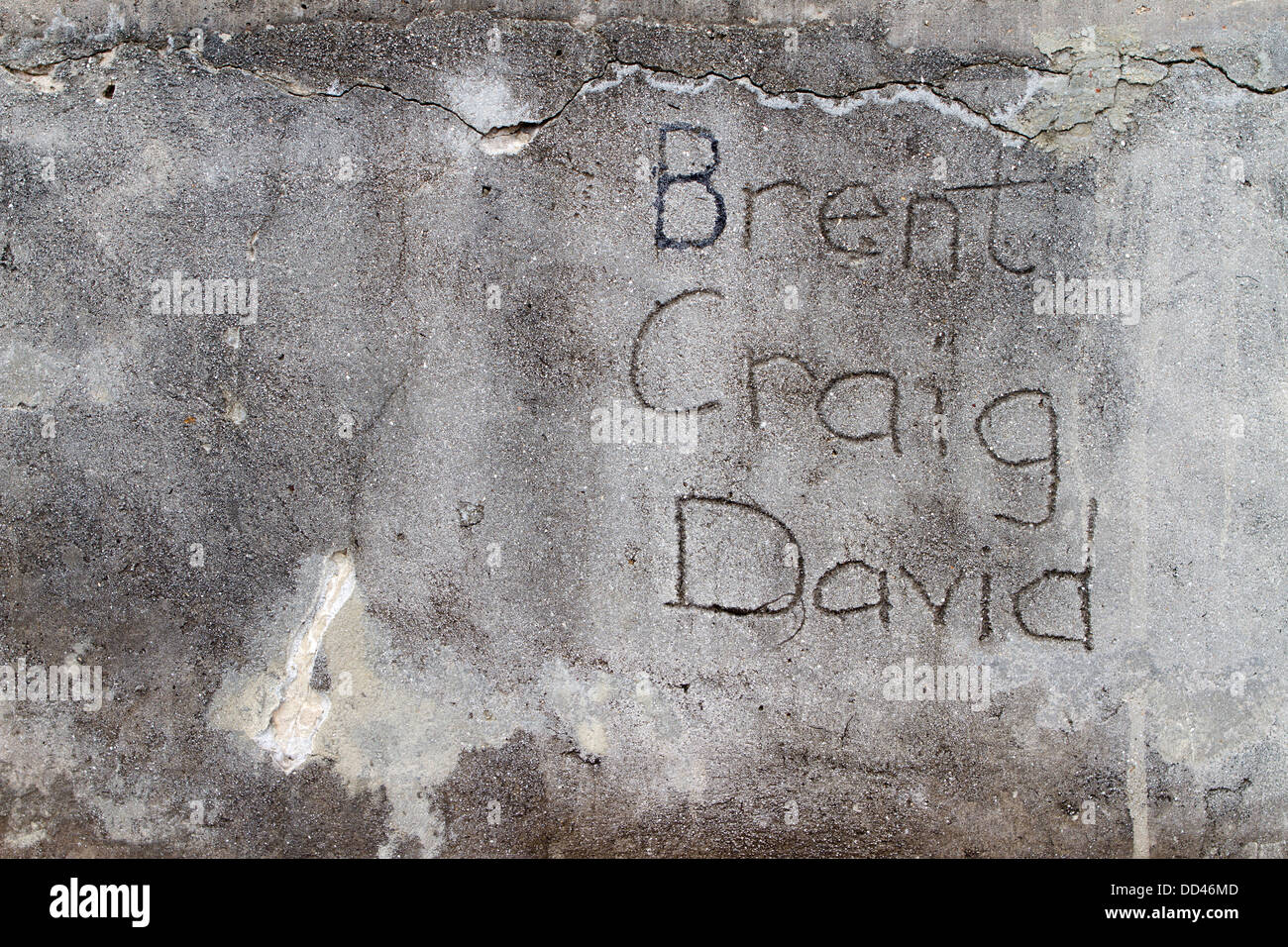 Names carved on concrete Stock Photo Alamy