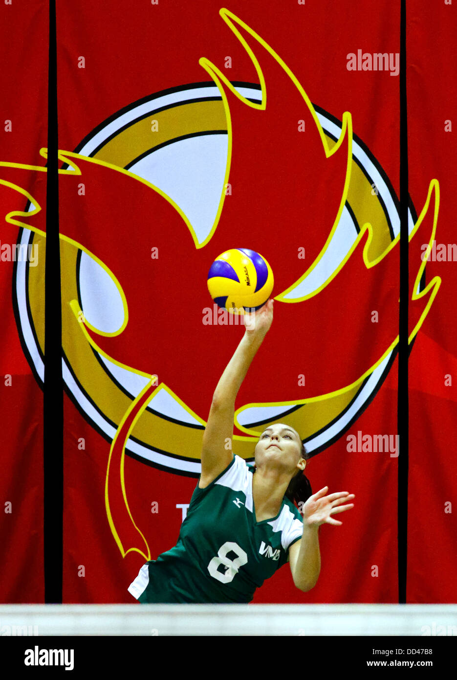 New Brunswick's Laura Kaye serves in women's volleyball at the Canada Games August 5, 2013 in Sherbrooke, Canada. Stock Photo