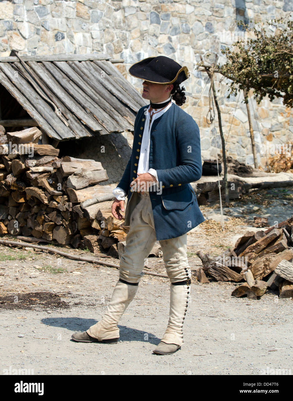 A Fort Ticonderoga guide dressed as a French soldier standing and talking. Stock Photo