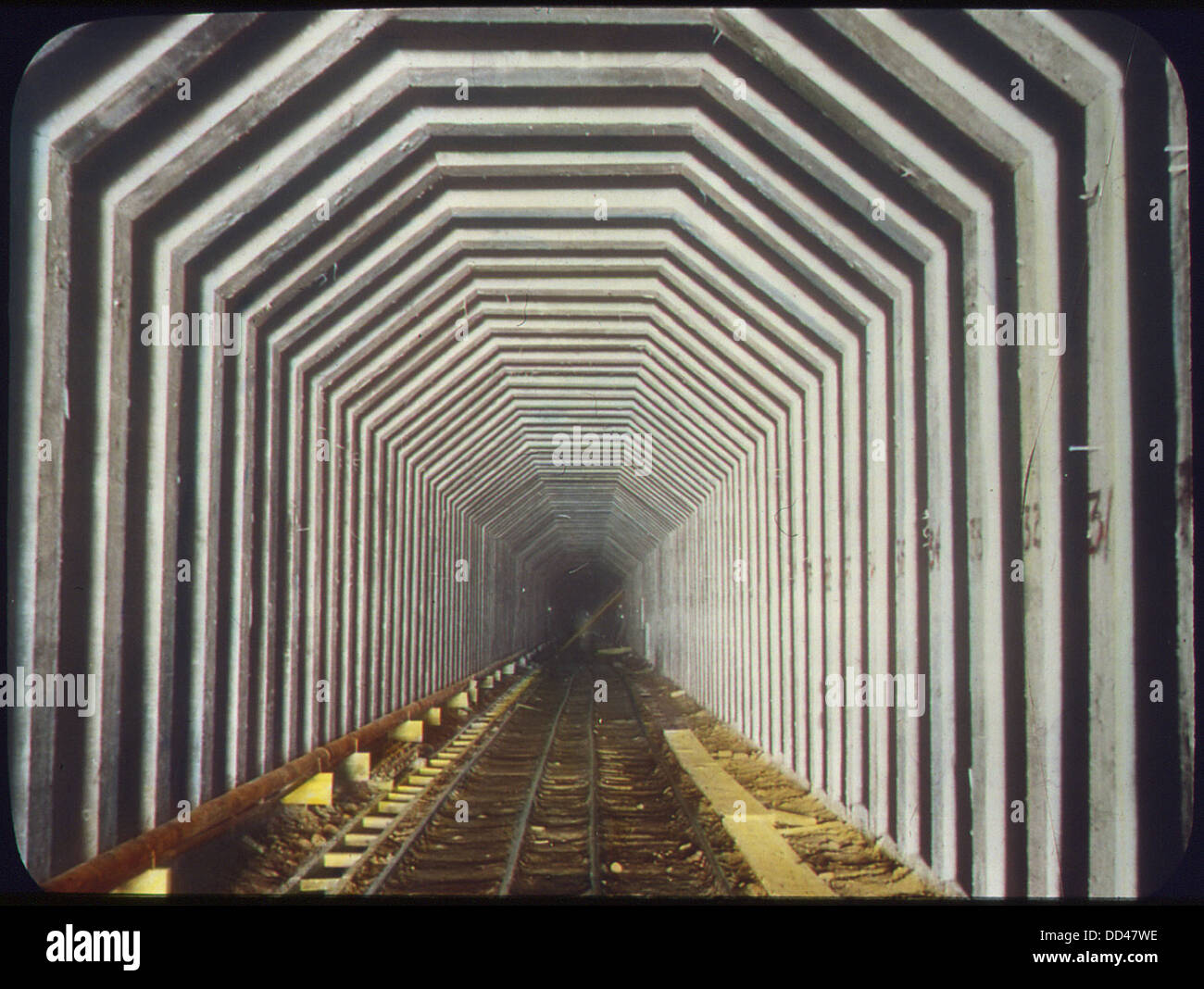 The image shows timbering work being conducted in a tunnel at the west ...