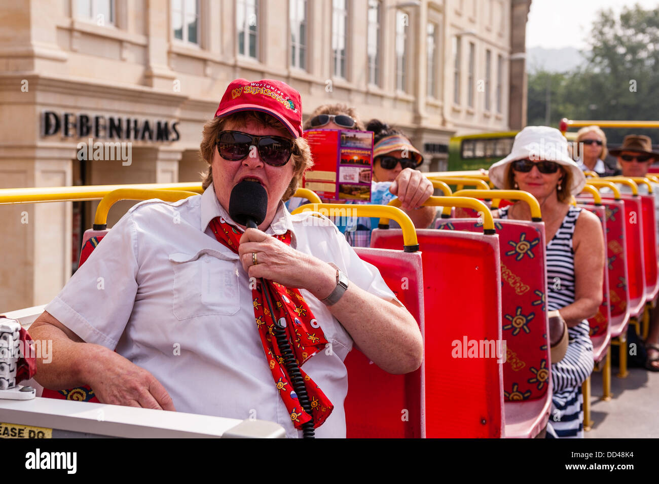 Tour guide talking on bus hi-res stock photography and images - Alamy