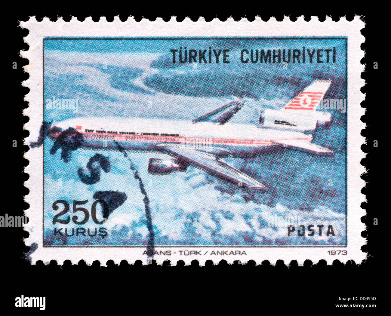 Postage stamp from Turkey depicting a DC-10 in flight. Stock Photo