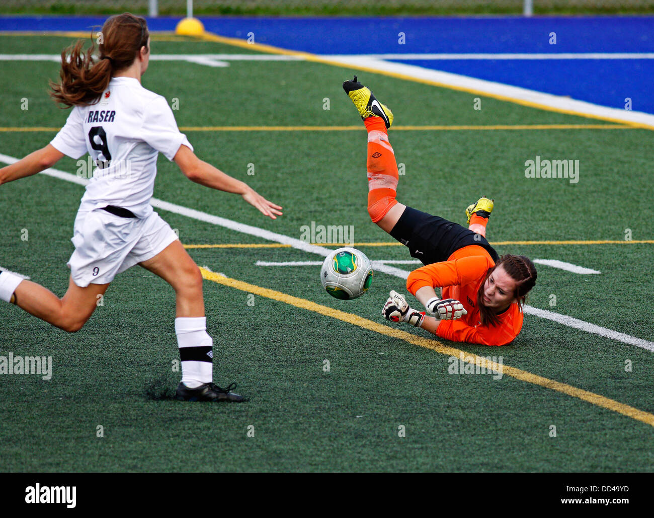 Women's soccer keeper Nicole McInnis of Prince Edward Island makes a save at the Canada Games August 7, 2013 in Sherbrooke, Que. Stock Photo