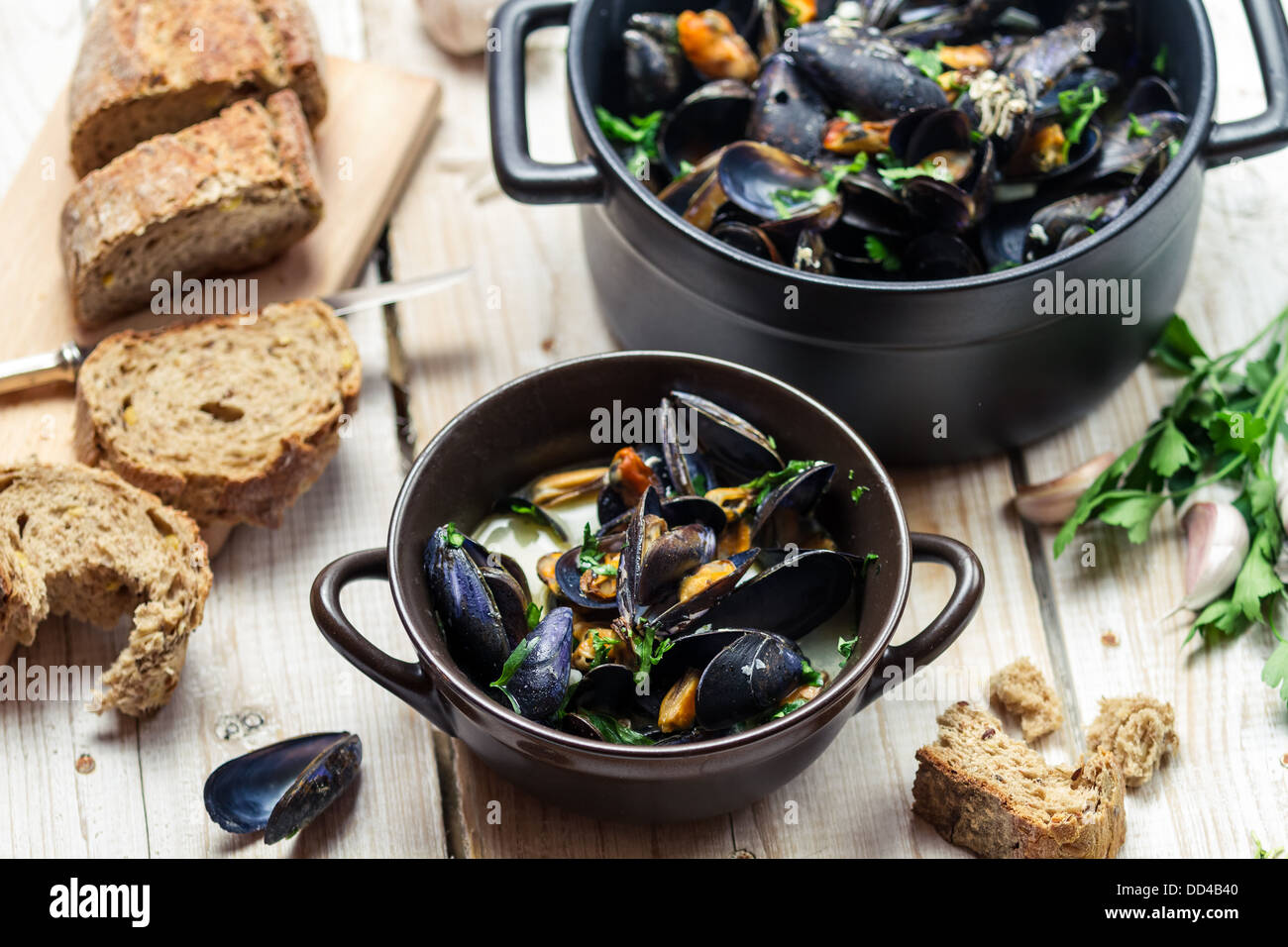 Fresh ingredients for a dish cooked with mussels Stock Photo